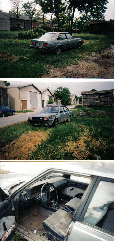 unknown wrecked Carina sedan