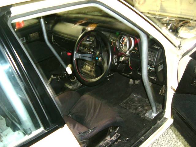 Rollcage, bucketseats and new tach Rollcage, bucketseats and new tach