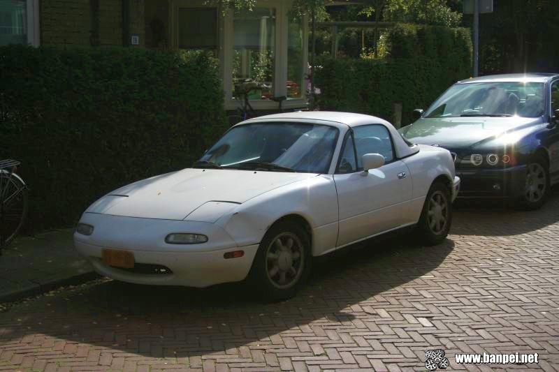 I pass this White Mazda Miata every day as well