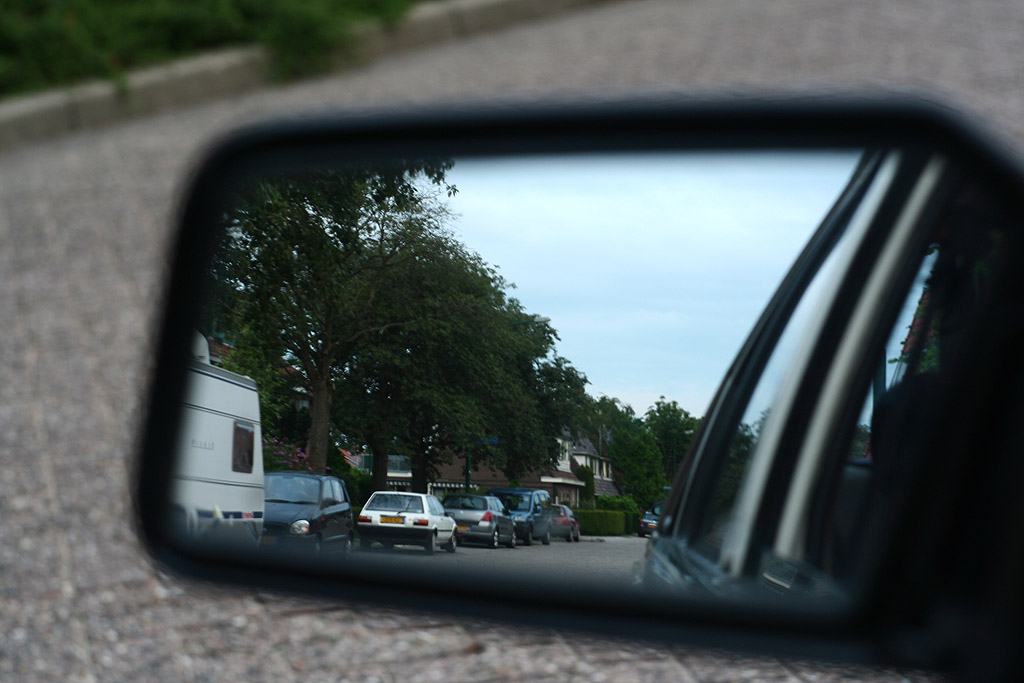Toyota Corolla EE80 in rear view mirror
