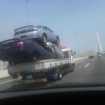 WTF: Flatbed hauling three RWD Nissans
