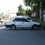 Bali: Ford Laser (Mazda Familia) on Longchamps