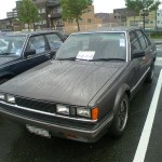 Carina Sightings: dark-grey panda Carina sedan