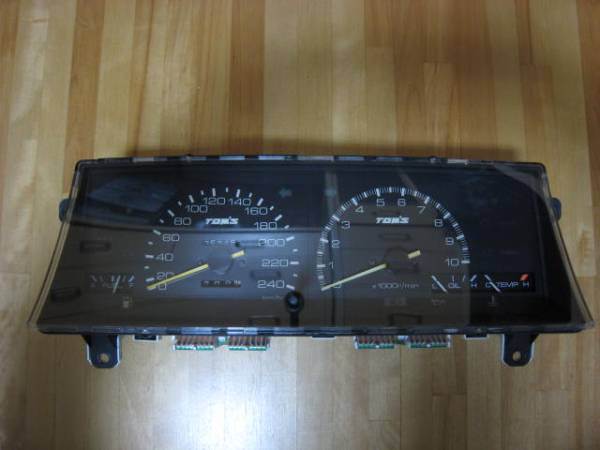 TOM's AE86 gauge cluster with 240 km/h speedometer and 10K rpm tachometer