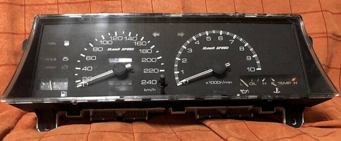 Sleek SPEED AE86 gauge cluster with 240 km/h speedometer and 10K rpm tachometer