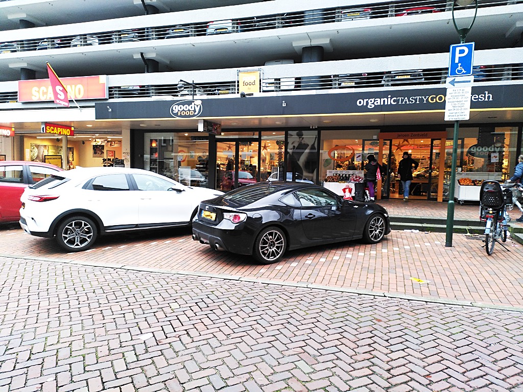 Toyota GT86 parked in the disabled parking area