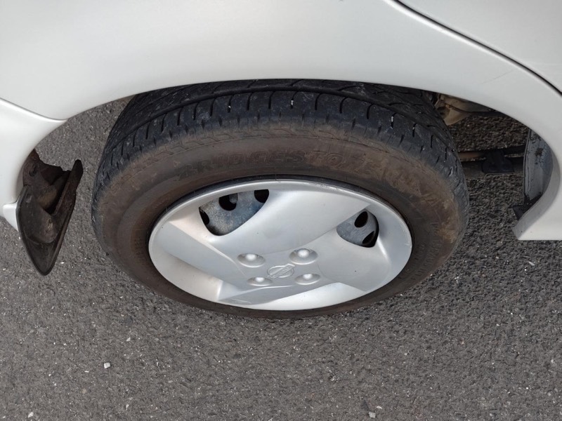 Nissan March White Limited K11 - Cheap hubcaps