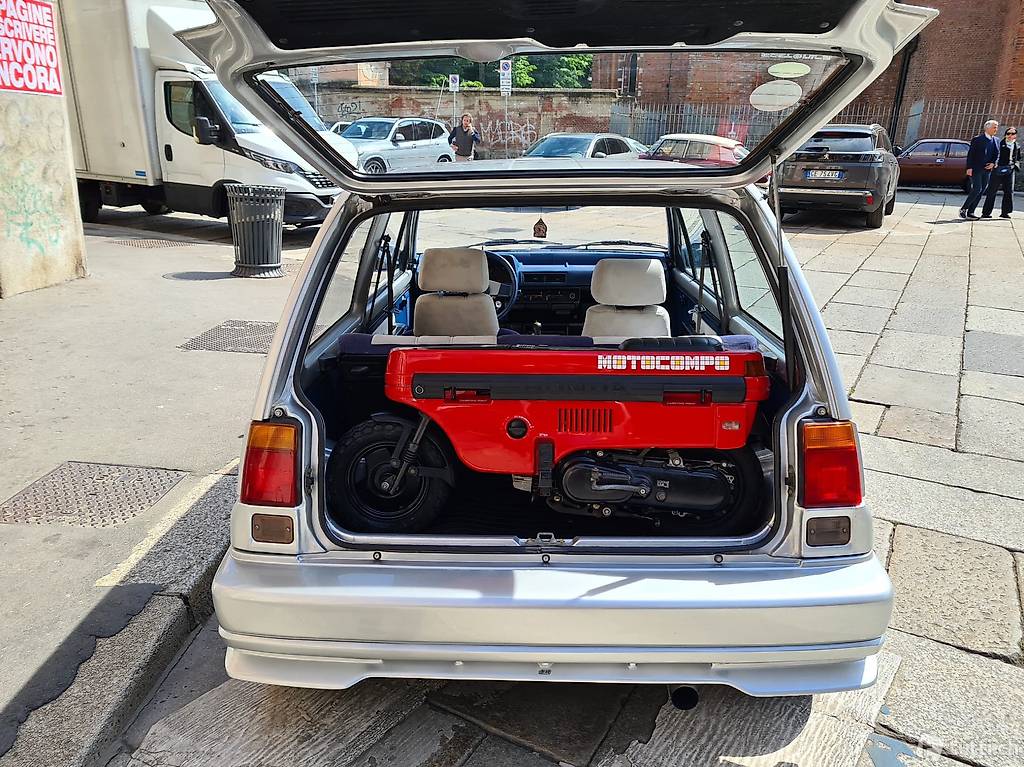 Honda City Turbo II with red Motocompo in the boot