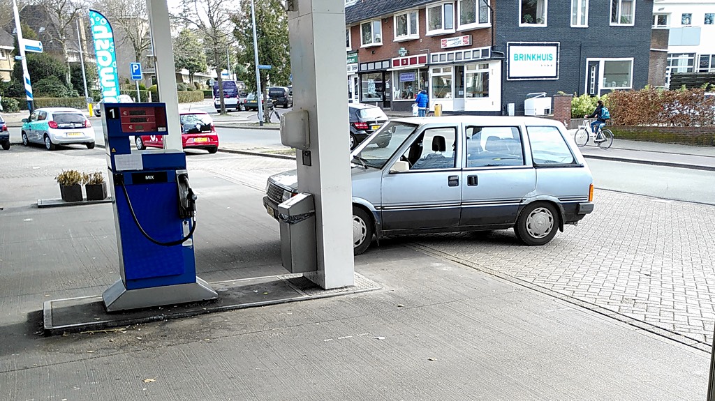 Blue 1985 Nissan Prairie - encounter at a petrol station