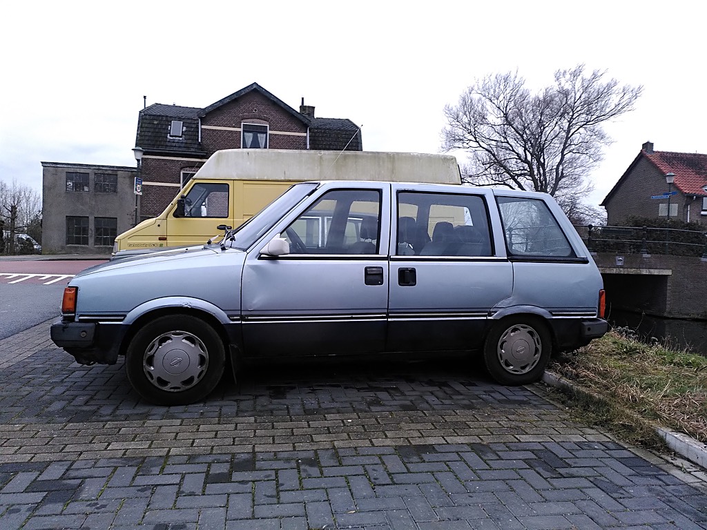 Blue 1985 Nissan Prairie - LPG converted daily beater