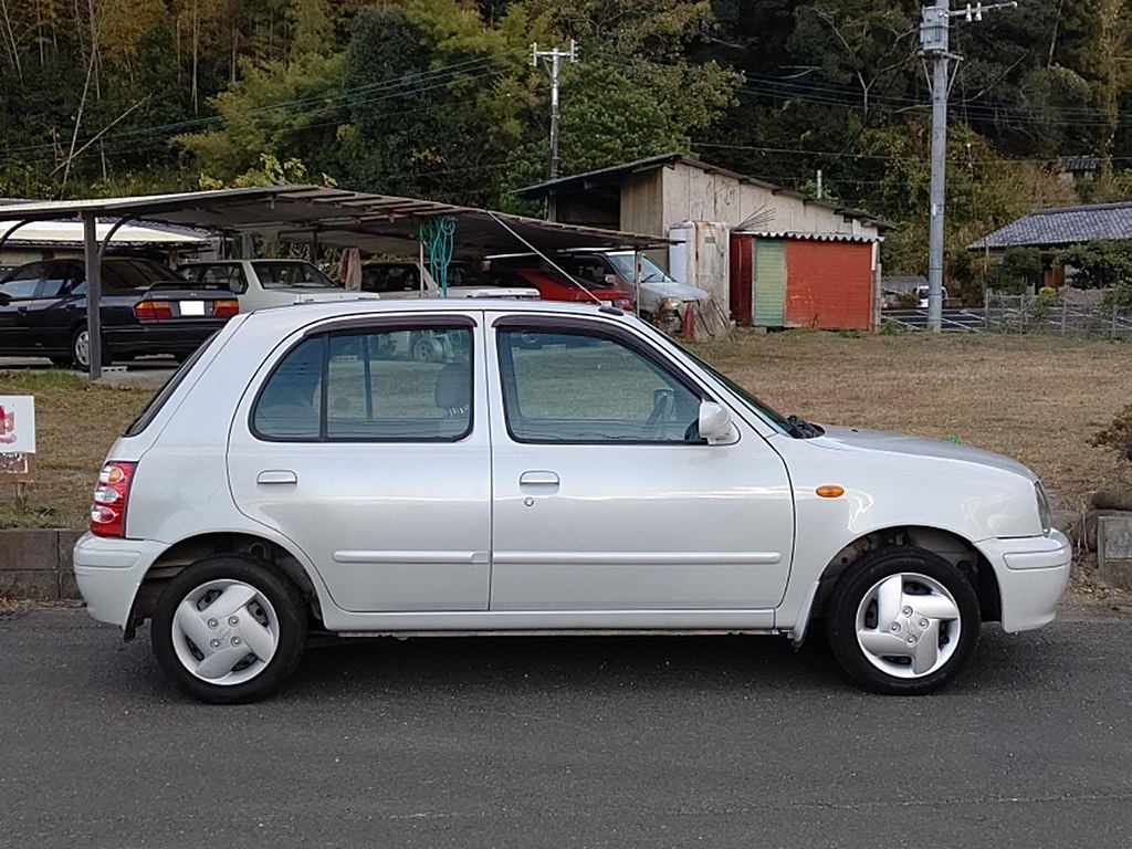 Nissan March White Limited - Also notice the Primera GT, Corona GT-TR TT140 and Celica XX in the background