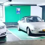 EV charging spot hogging 1990 Mazda Miata – Down on the Street