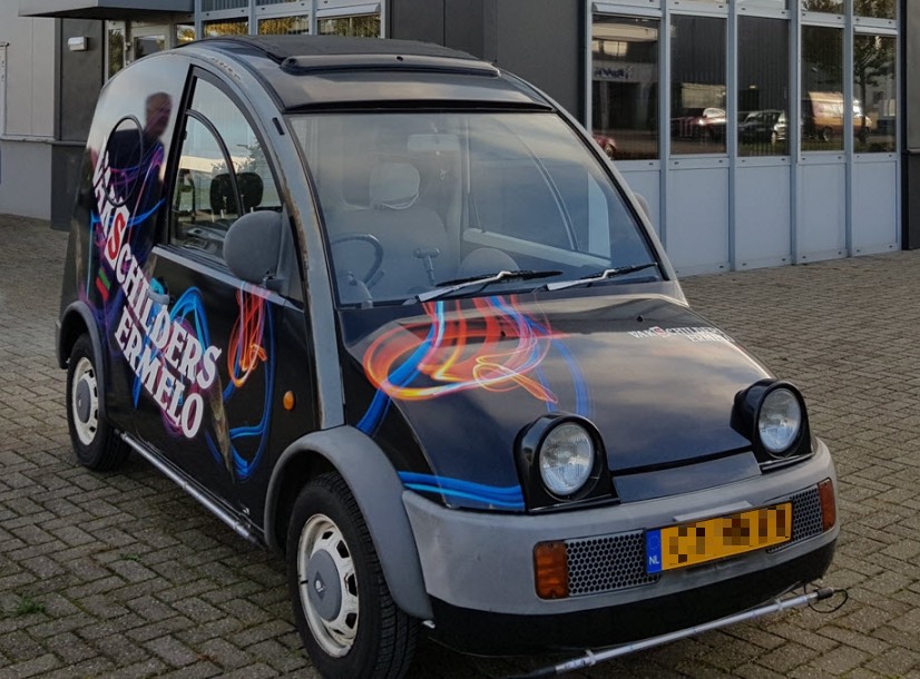 Black Nissan S-Cargo owned by a painter