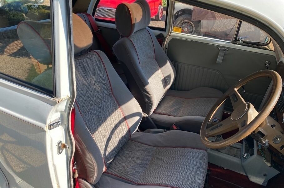 The seats are from another car, but we can see a Celica A40 steering wheel inside